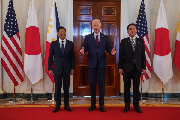 U.S. President Joe Biden hosts Philippine President Ferdinand Marcos Jr. and Japan Prime Minister Fumio Kishida for a trilateral summit at the White House, in Washington, U.S., April 11, 2024. REUTERS/Kevin Lamarque
